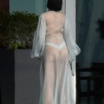 Rihanna Goes Braless In A Sheer Robe And Thong While Wielding A Gun On The Set Of Her New Music Video In Miami