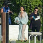 Rihanna Goes Braless In A Sheer Robe And Thong While Wielding A Gun On The Set Of Her New Music Video In Miami