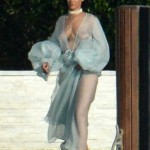 Rihanna Goes Braless In A Sheer Robe And Thong While Wielding A Gun On The Set Of Her New Music Video In Miami